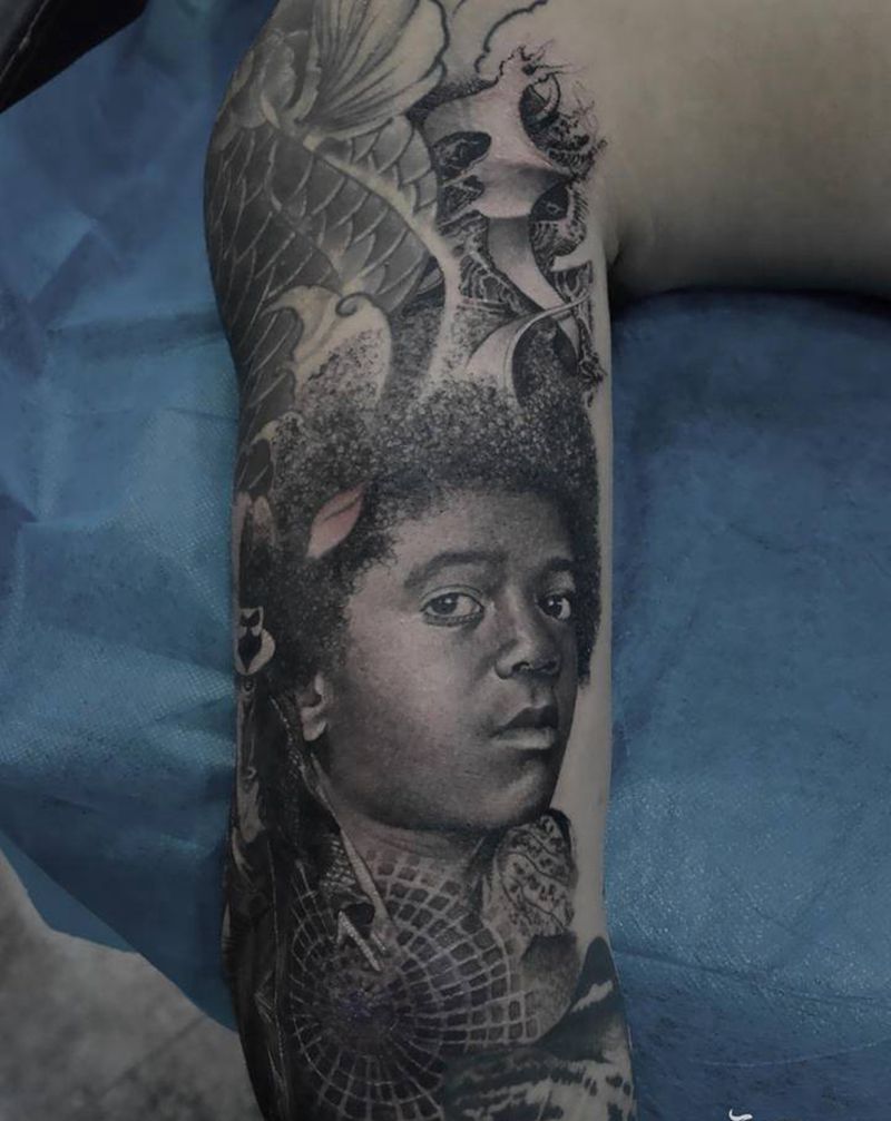 迈克杰克逊纹身图片_手臂欧美写实纹身图案