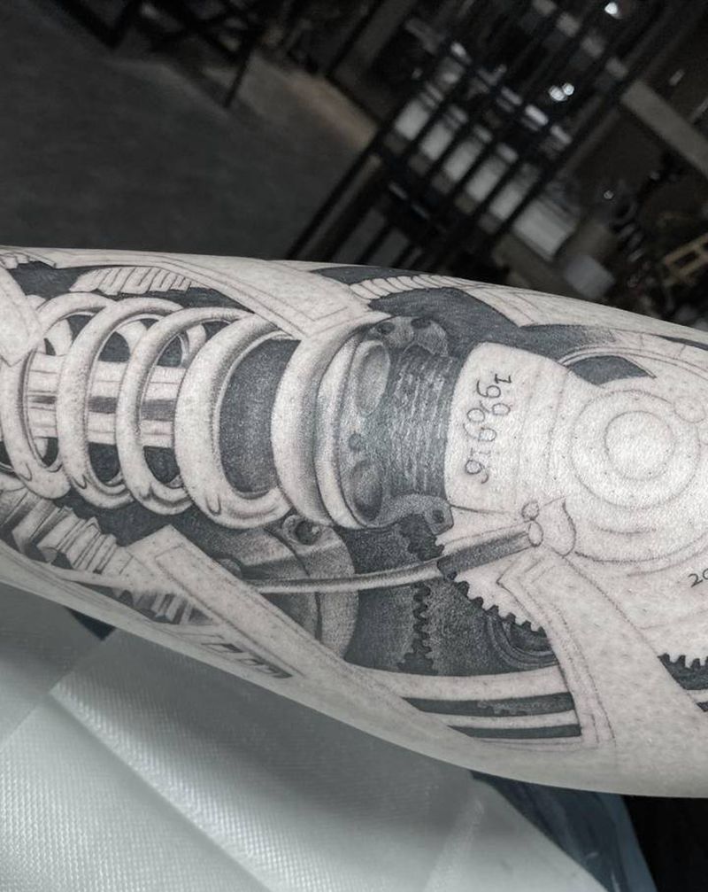 减震纹身图片_腿部纹身图案