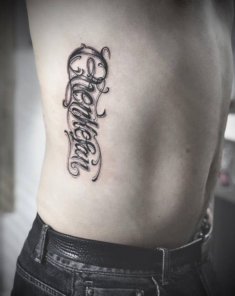 湖南湘西瞳画纹身图片_腰部纹身图案