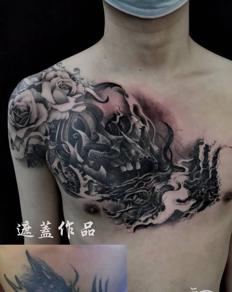 骷髅遮盖纹身图片_胸部欧美写实纹身图案