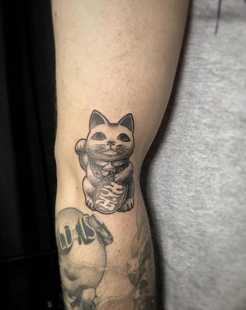 点刺招财猫纹身图片_手臂点刺招财猫纹身图案