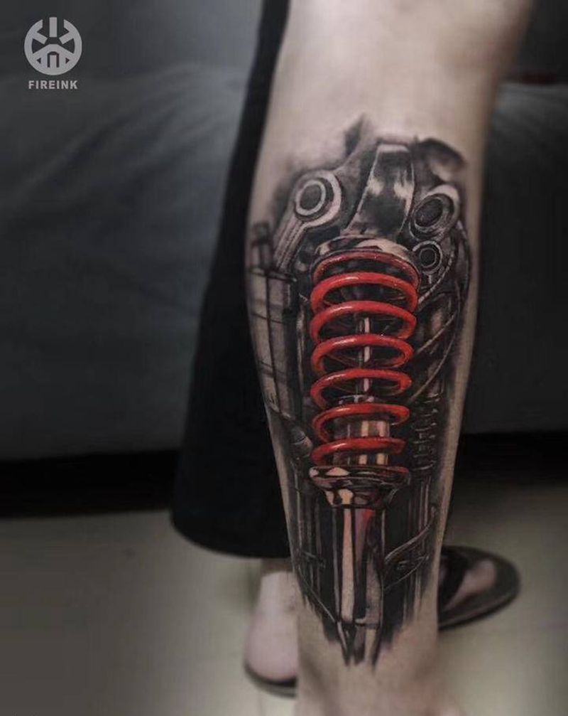 机震纹身图片_腿部欧美写实纹身图案