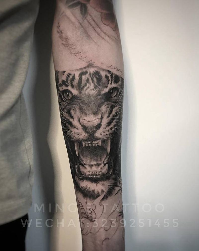 小脑斧纹身图片_手臂欧美写实老虎纹身图案