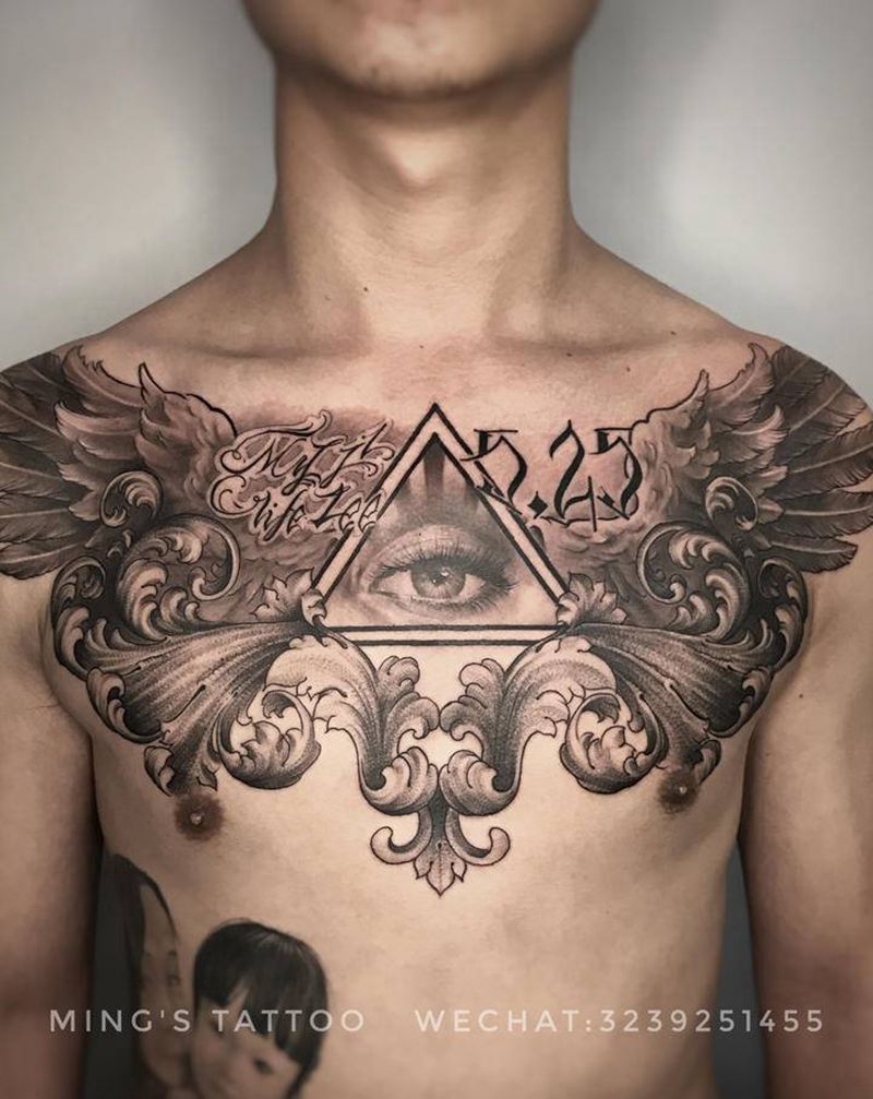 一枚大眼睛纹身图片_胸部欧美写实眼睛花胸纹身图案