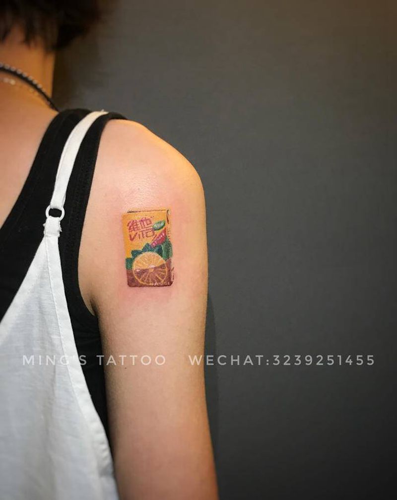 维他柠檬茶纹身图片_手臂欧美写实维他柠檬茶纹身图案