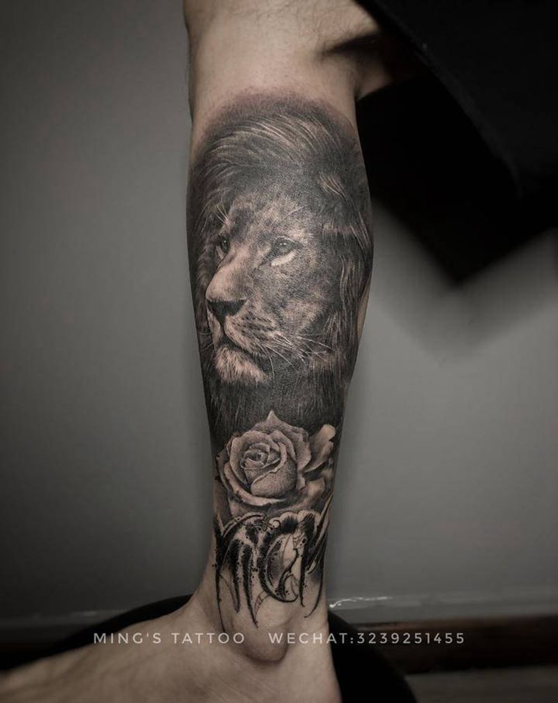 小狮子纹身图片_腿部欧美写实狮子玫瑰纹身图案