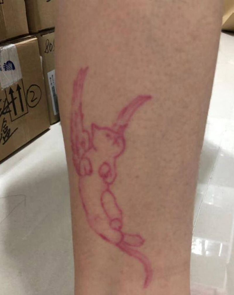 达摩蛋与招财猫纹身图片_腿部New School招财猫达摩蛋纹身图案