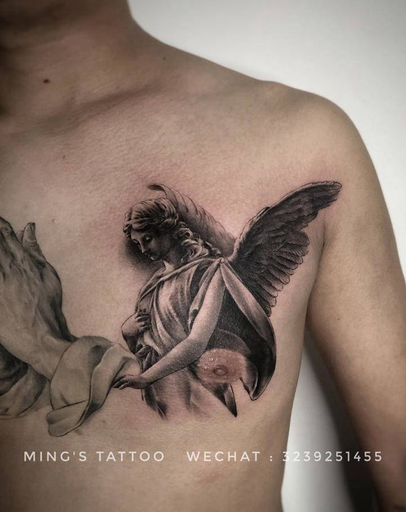 天使纹身图片_胸部欧美写实天使纹身图案
