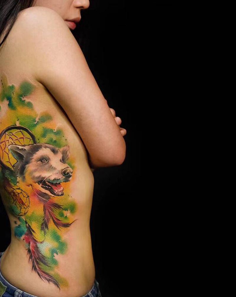 客人狗狗纹身图片_腰部背部水彩纹身图案