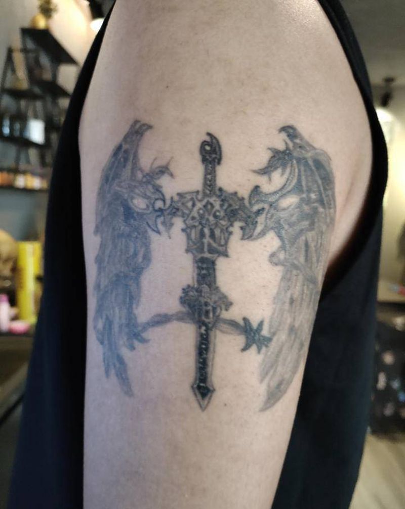 遮盖不迟到纹身图片_手臂欧美写实纹身图案