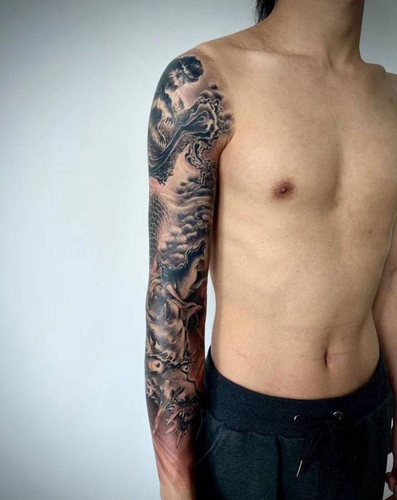 黑火学社第二期之父龙护猴纹身图片_手臂老传统纹身图案