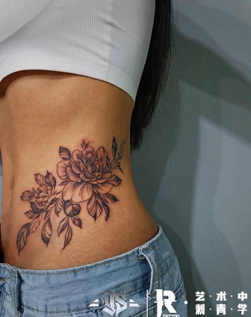 谁说皮肤黑就纹身不好看？纹身图片_腰部点刺水彩纹身图案