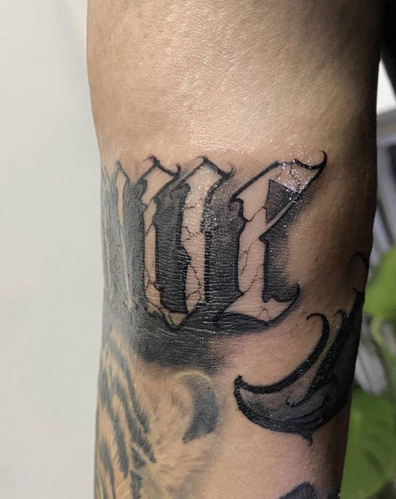 花体纹身图片_手臂花体字纹身图案