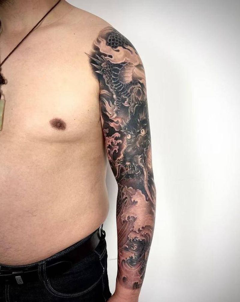 整臂龙纹身图片_手臂老传统纹身图案