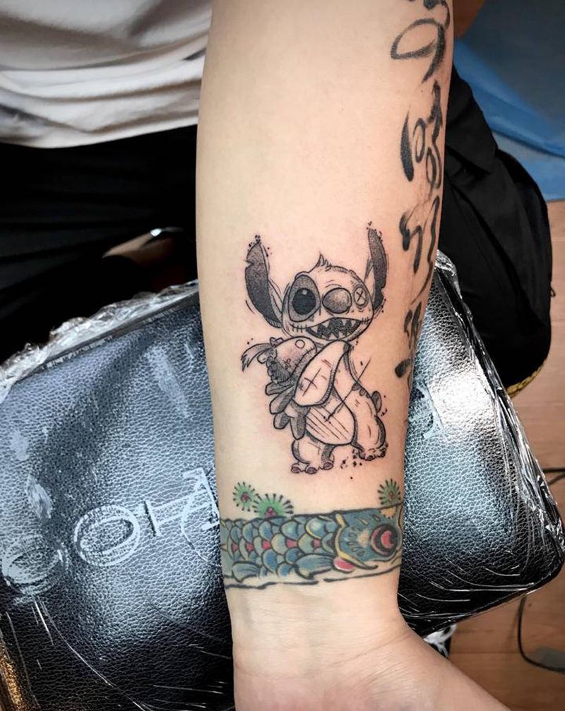 史迪仔纹身图片_手臂卡通纹身图案