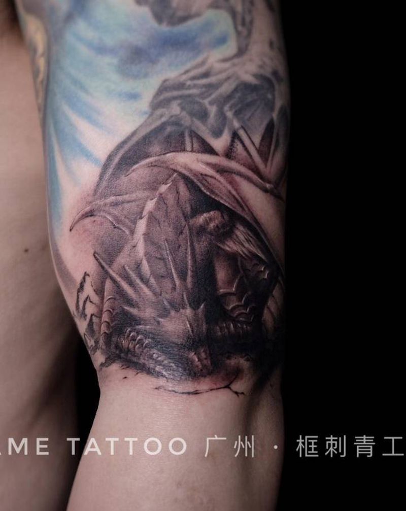 巨龙与火山纹身图片_手臂欧美写实纹身图案