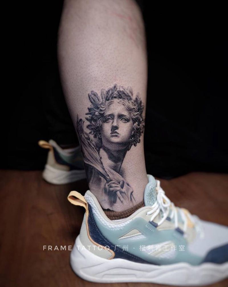 雕像纹身图片_腿部欧美写实雕像纹身图案