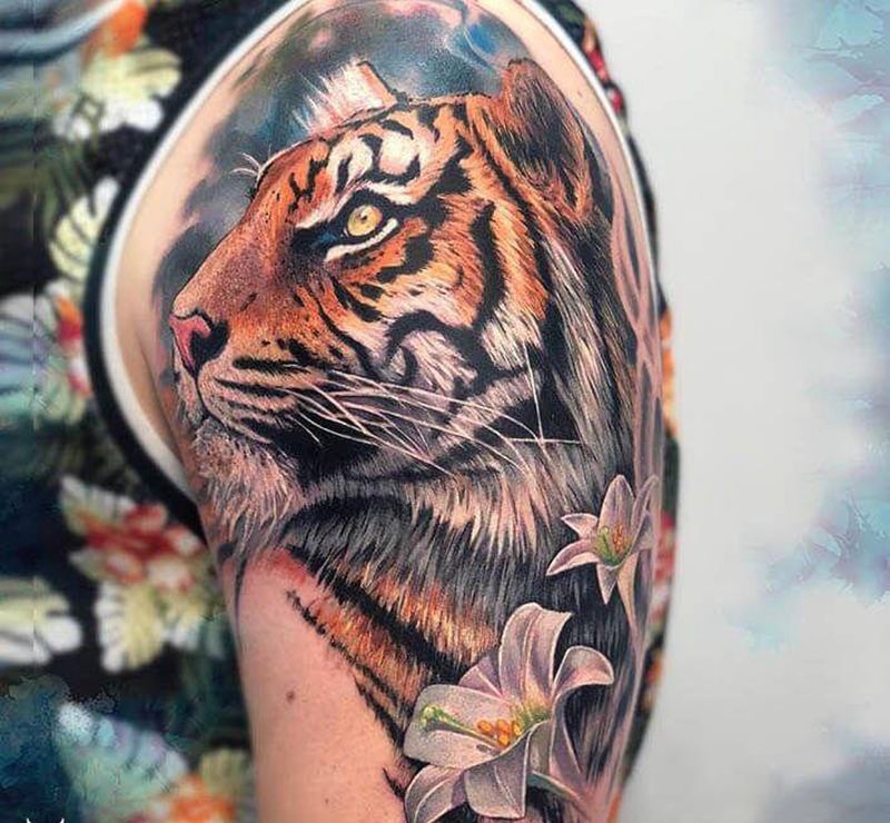 歐美写实老虎纹身图片_手臂欧美写实写实老虎彩色老虎纹身图案