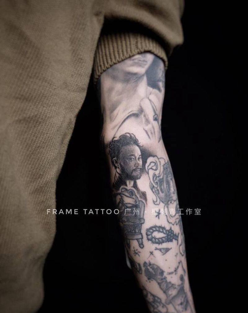 E神纹身图片_手臂欧美写实陈奕迅Eason纹身图案