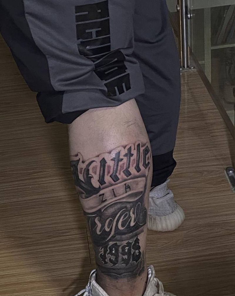 定制花体字遮盖纹身图片_腿部花体字纹身图案