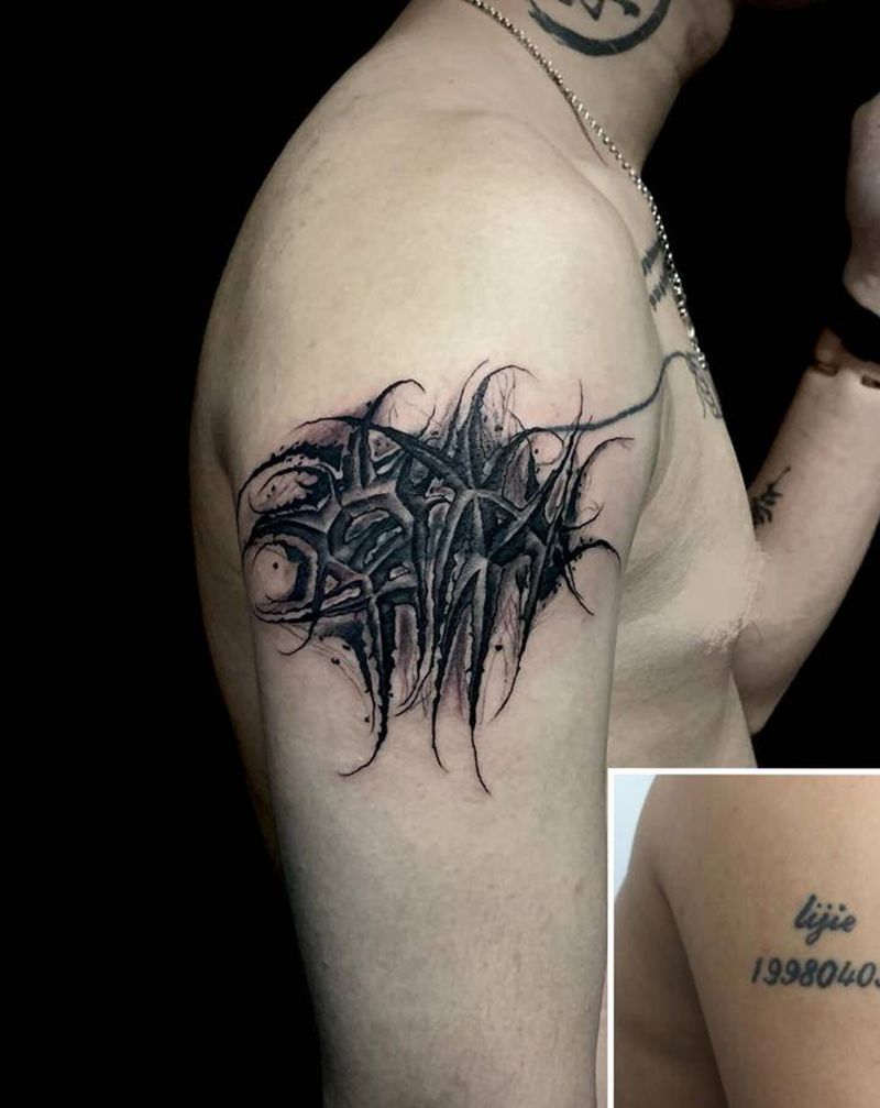 花体遮盖纹身图片_手臂花体字纹身图案