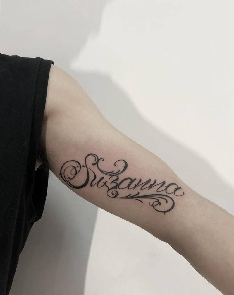 花体字纹身图片_手臂花体字花体字纹身图案