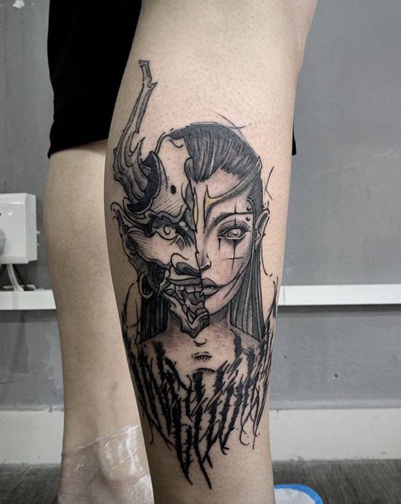 面具女纹身图片_腿部纹身图案