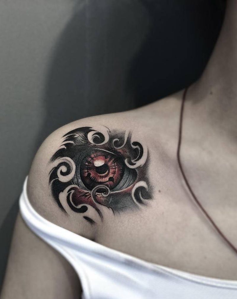 写轮眼纹身图片_胸部肩部纹身图案