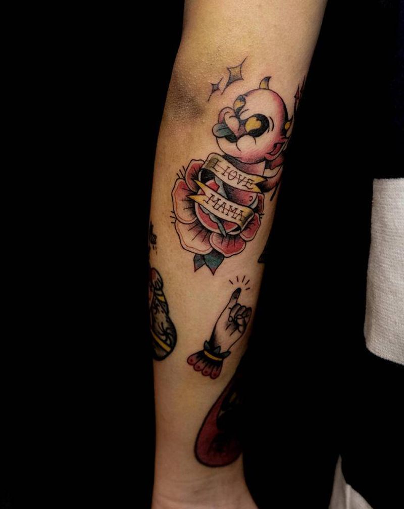 花朵里蹦出个小恶魔纹身图片_手部Old School花恶魔纹身图案