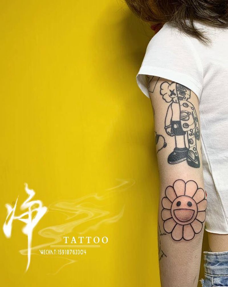 花臂小图拼接纹身图片_手臂太阳花纹身图案