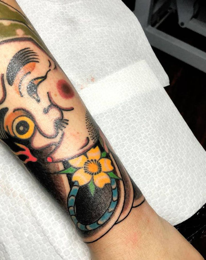 包小臂、未完待续纹身图片_手臂手部老传统吹火男板雾纹身图案