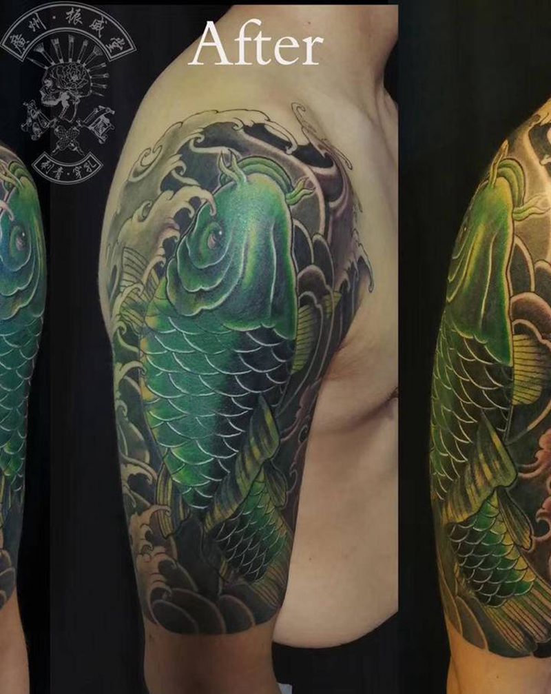 鲤鱼是遮盖的好素材纹身图片_手臂新传统鲤鱼纹身图案
