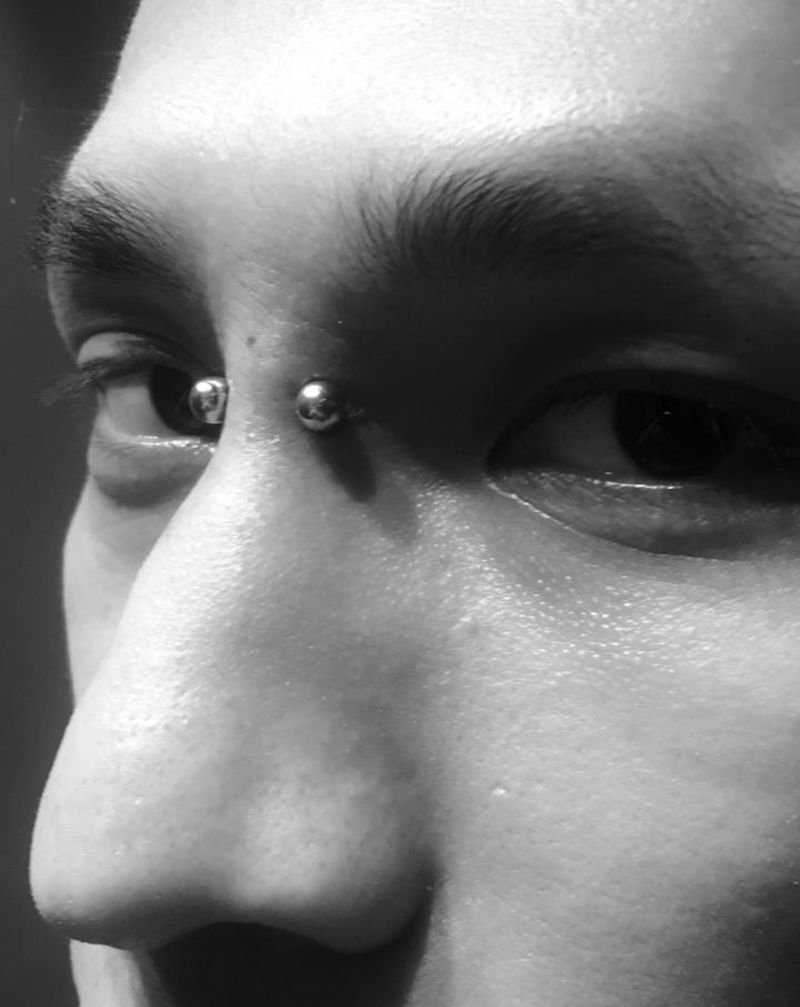 埋釘 穿孔纹身图片_穿孔纹身图案