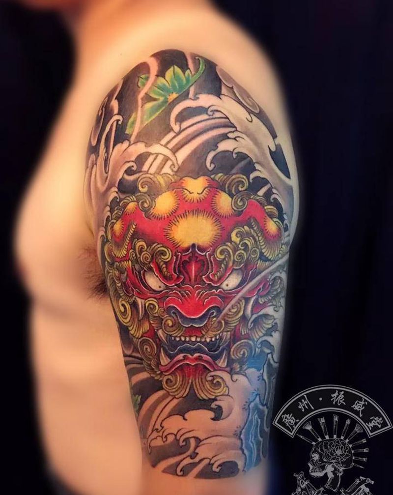 唐狮子纹身图片_手臂新传统唐狮子纹身图案