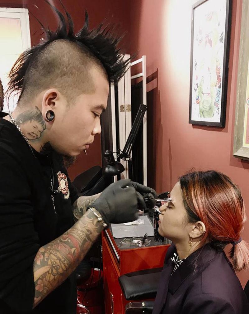 眉钉纹身图片_穿孔纹身图案