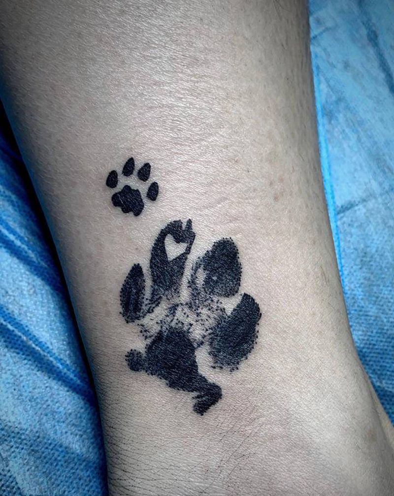 小爪子纹身图片_脚部点刺图腾纹身图案