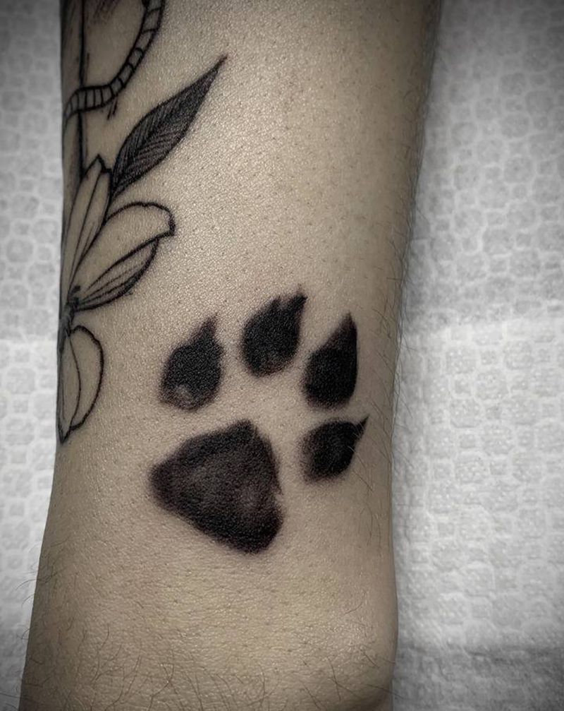 小猫爪印纹身图片_脚部腿部点刺几何纹身图案