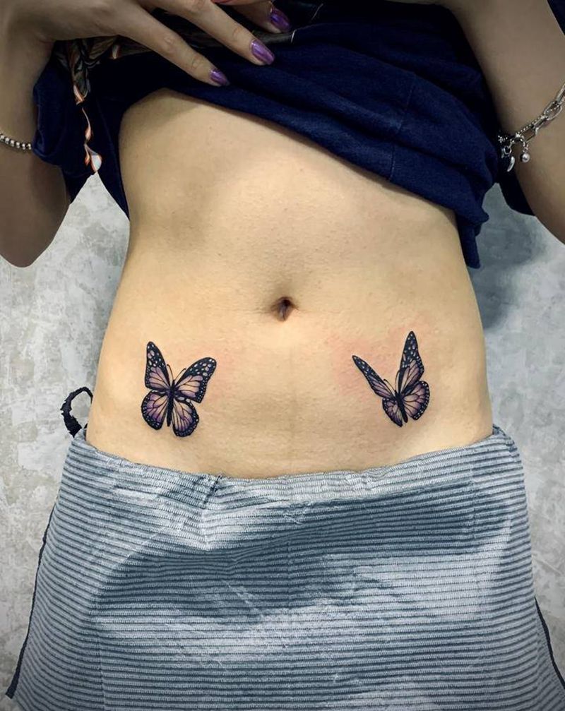 蝴蝶纹身图片_腹部水彩点刺纹身图案