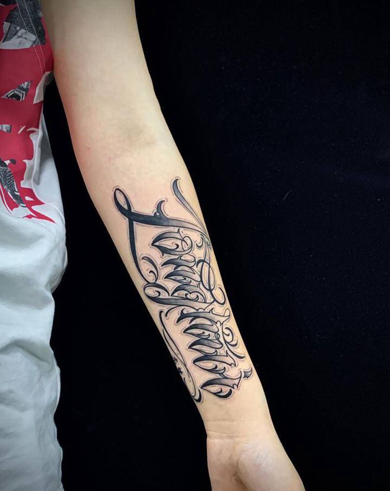 花体字纹身图片_手臂花体字纹身图案