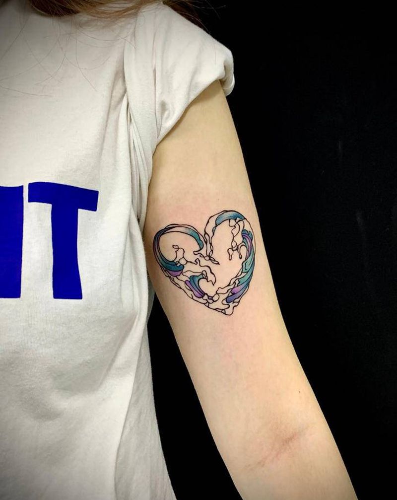 心纹身图片_手臂点刺几何纹身图案