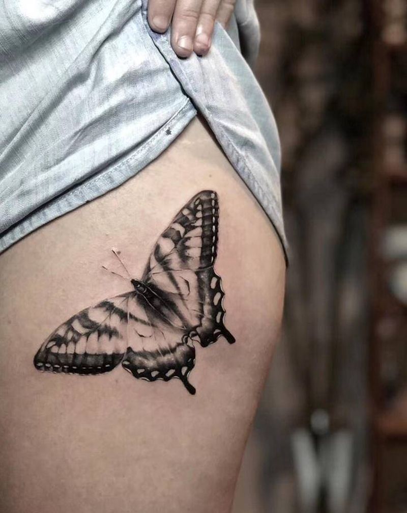 蝴蝶纹身图片_腿部欧美写实纹身图案