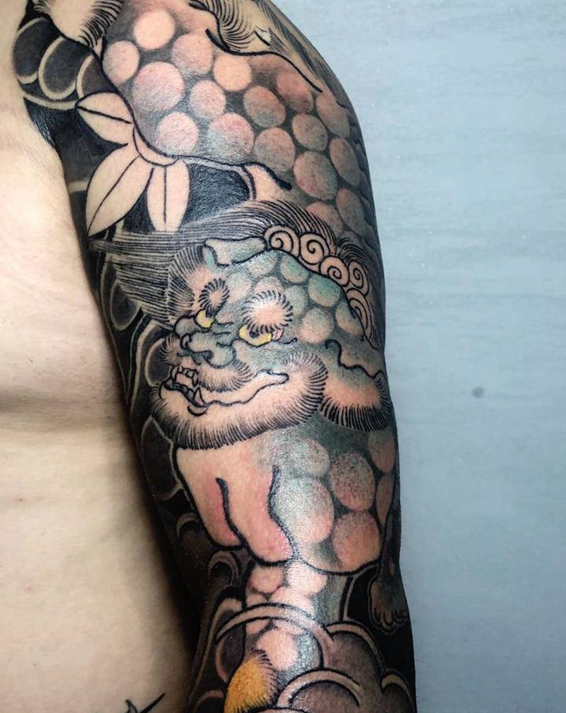 唐狮子纹身图片_手部手臂老传统纹身图案