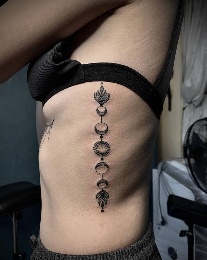 小图纹身图片_腰部点刺图腾纹身图案