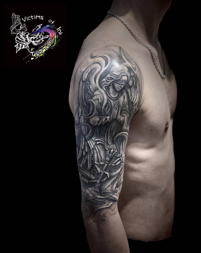 天秤座纹身图片_手臂欧美写实纹身图案