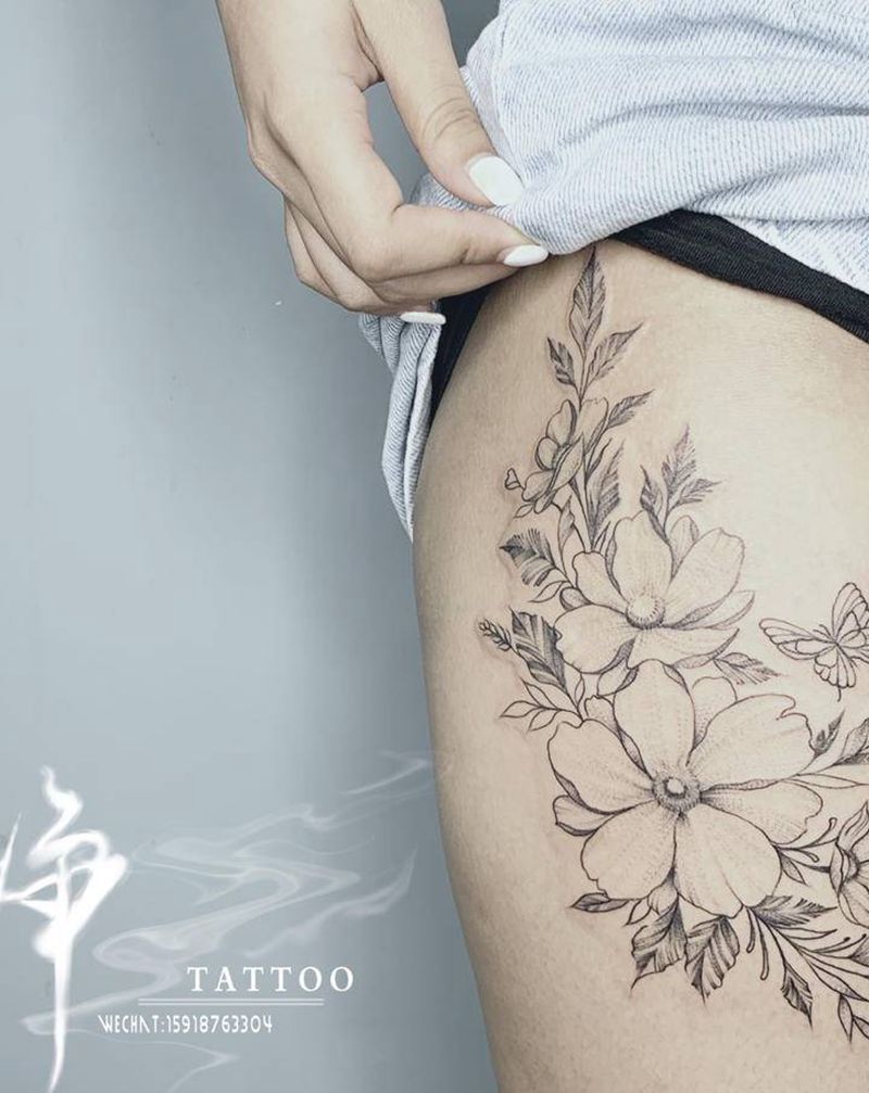 素花纹身图片_腿部点刺几何花纹身图案