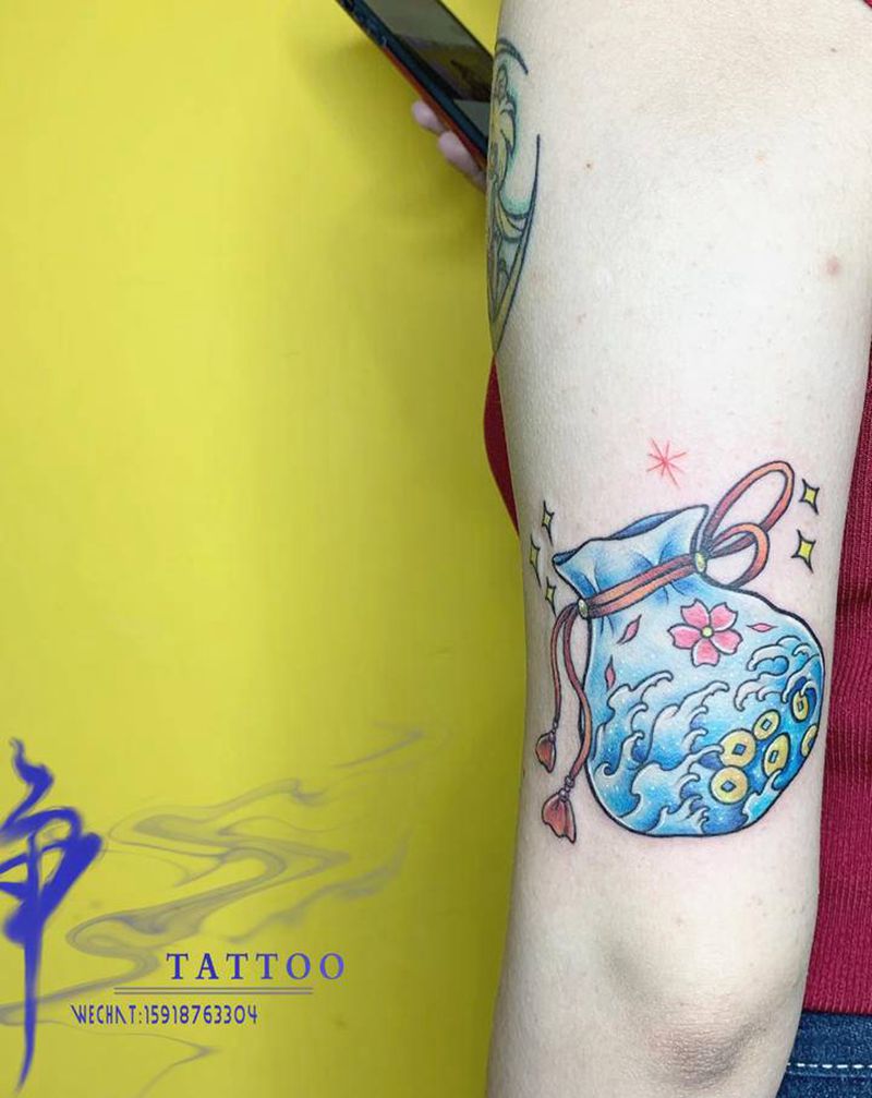 钱袋纹身图片_手部手臂New School新传统钱袋纹身图案