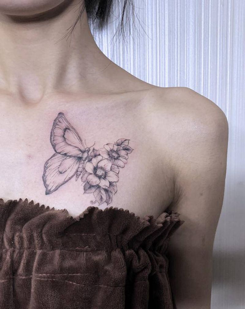 【素花蝴蝶】纹身图片_肩部胸部点刺素花蝴蝶纹身图案