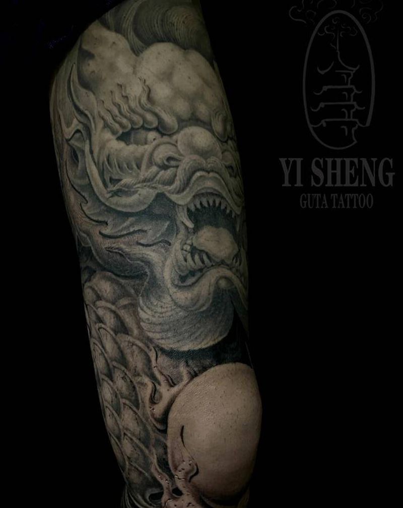 石雕盘龙腿纹身图片_腿部欧美写实石雕纹身图案