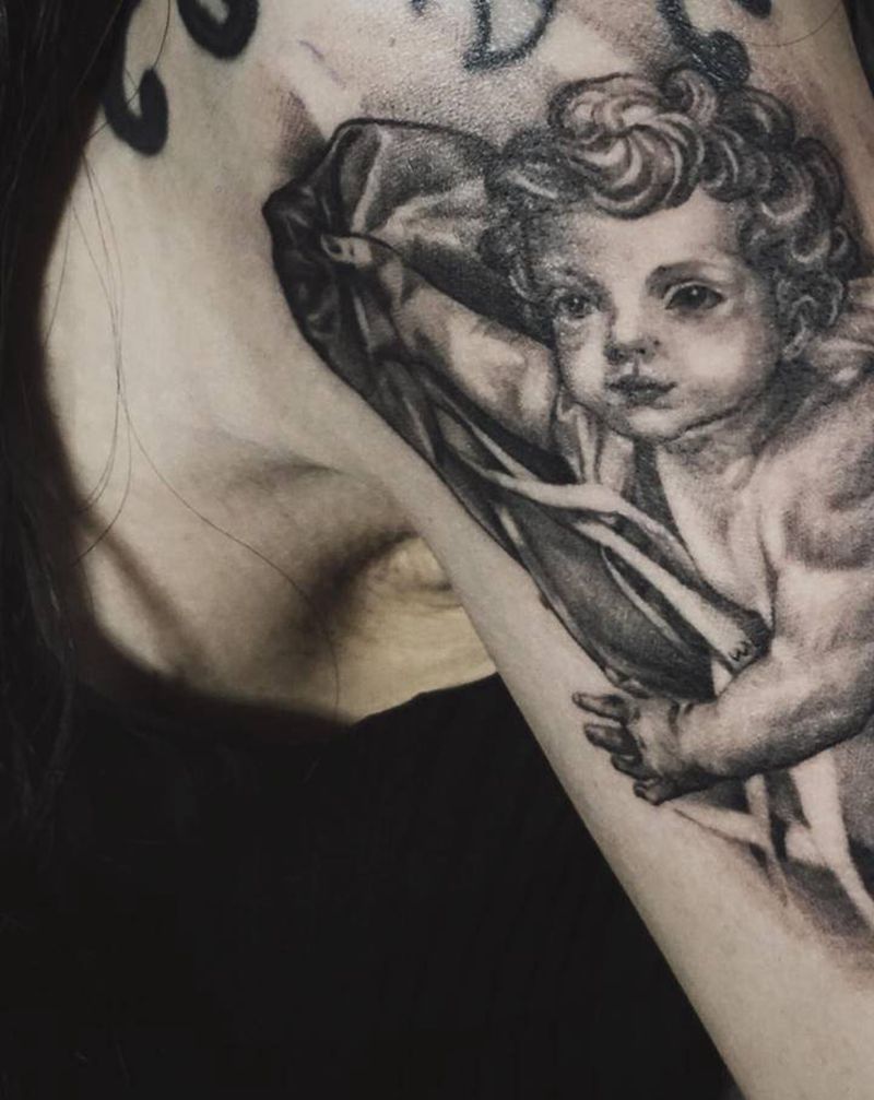 天使纹身图片_手臂欧美写实天使纹身图案