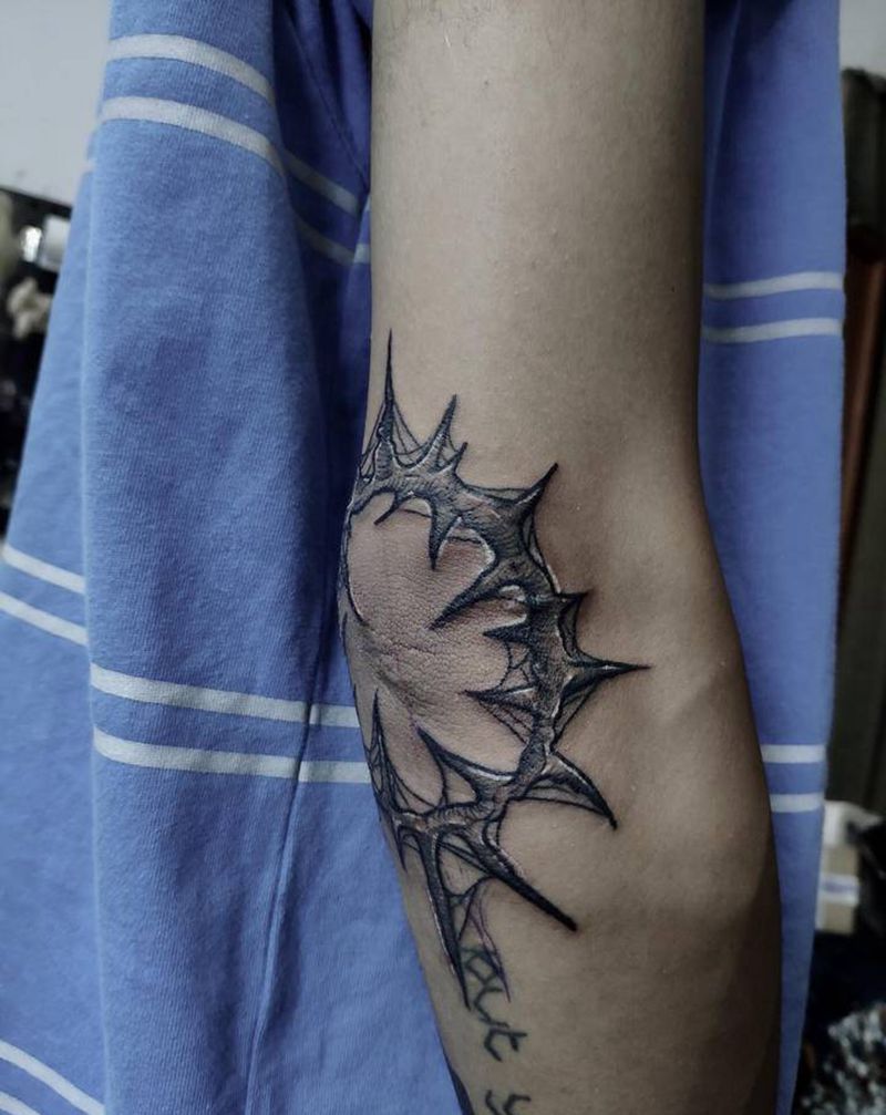 荆棘爆肘纹身图片_欧美写实纹身图案